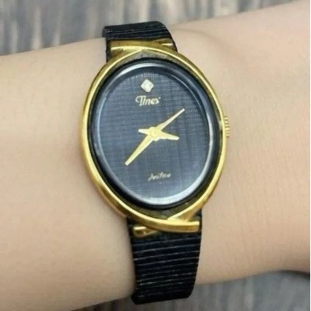 Timex Women's Watch Unique gold bevel. Working, New Battery Black Metal Band